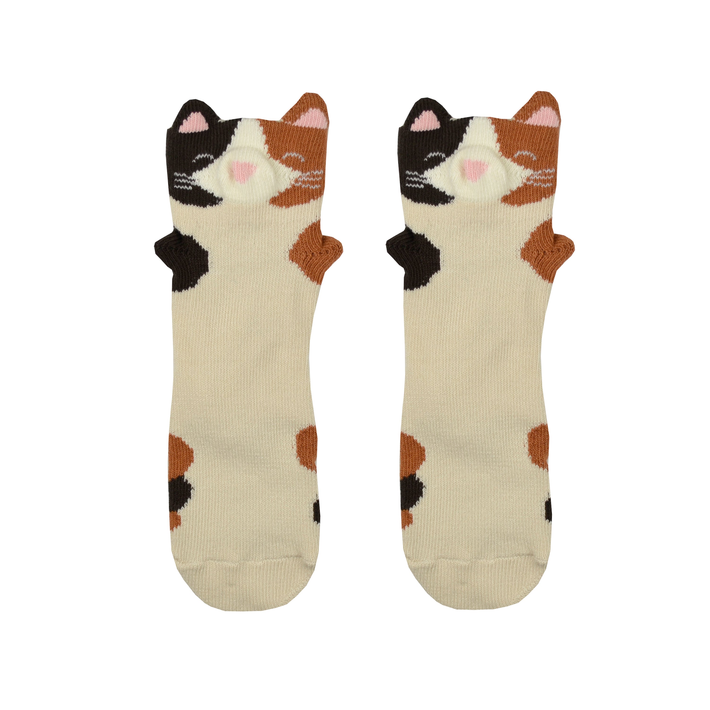 Shown in a flatlay, a pair of Foot Traffic brand kids cotton crew sock in off white with light and dark brown spots like a calico cat! The top of the sock features a cute cat face and 2 ears.