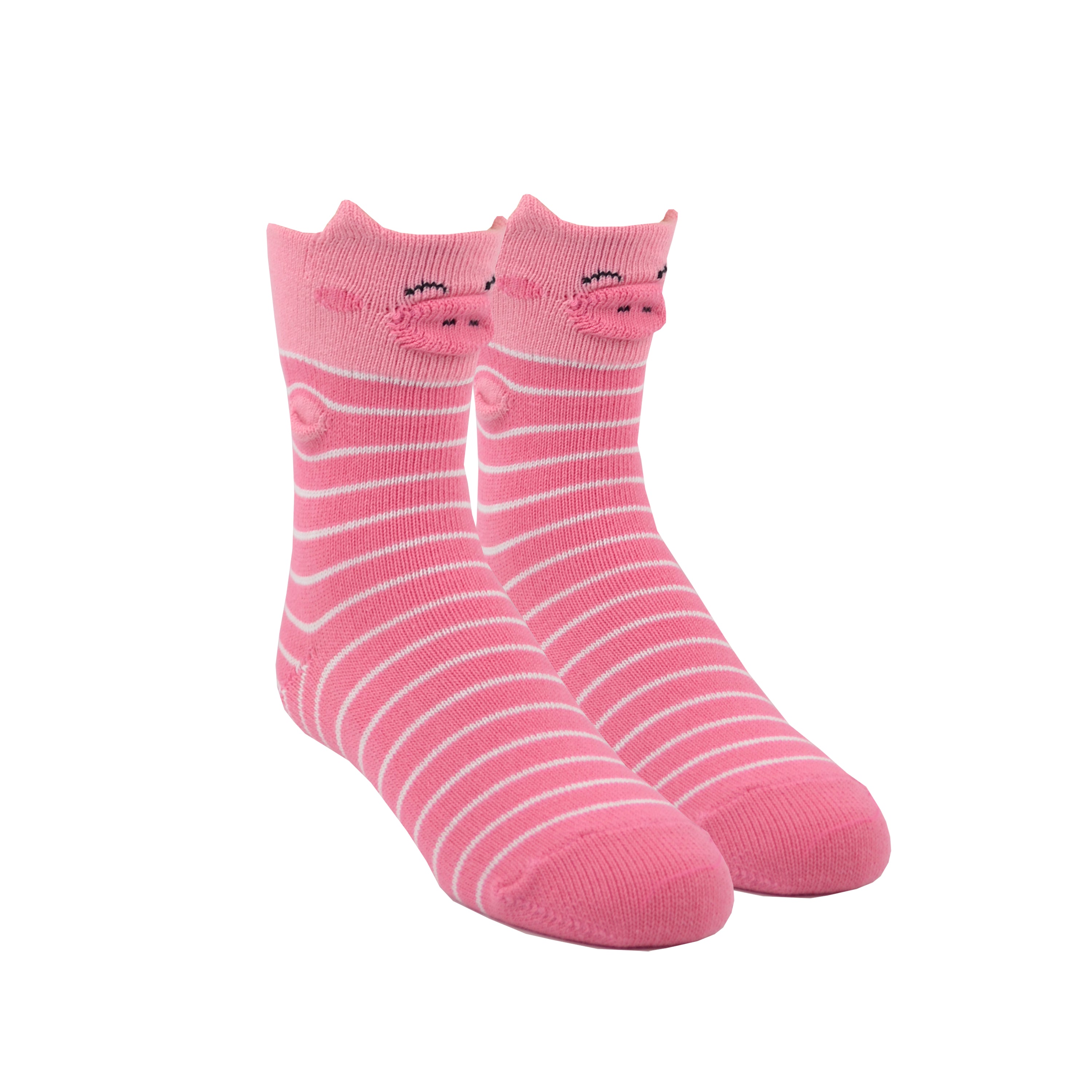 Shown on foot forms a pair of kids Foot Traffic cotton pig socks. These are pink with white stripes and feature 3D pig ears, arms, and snoot.