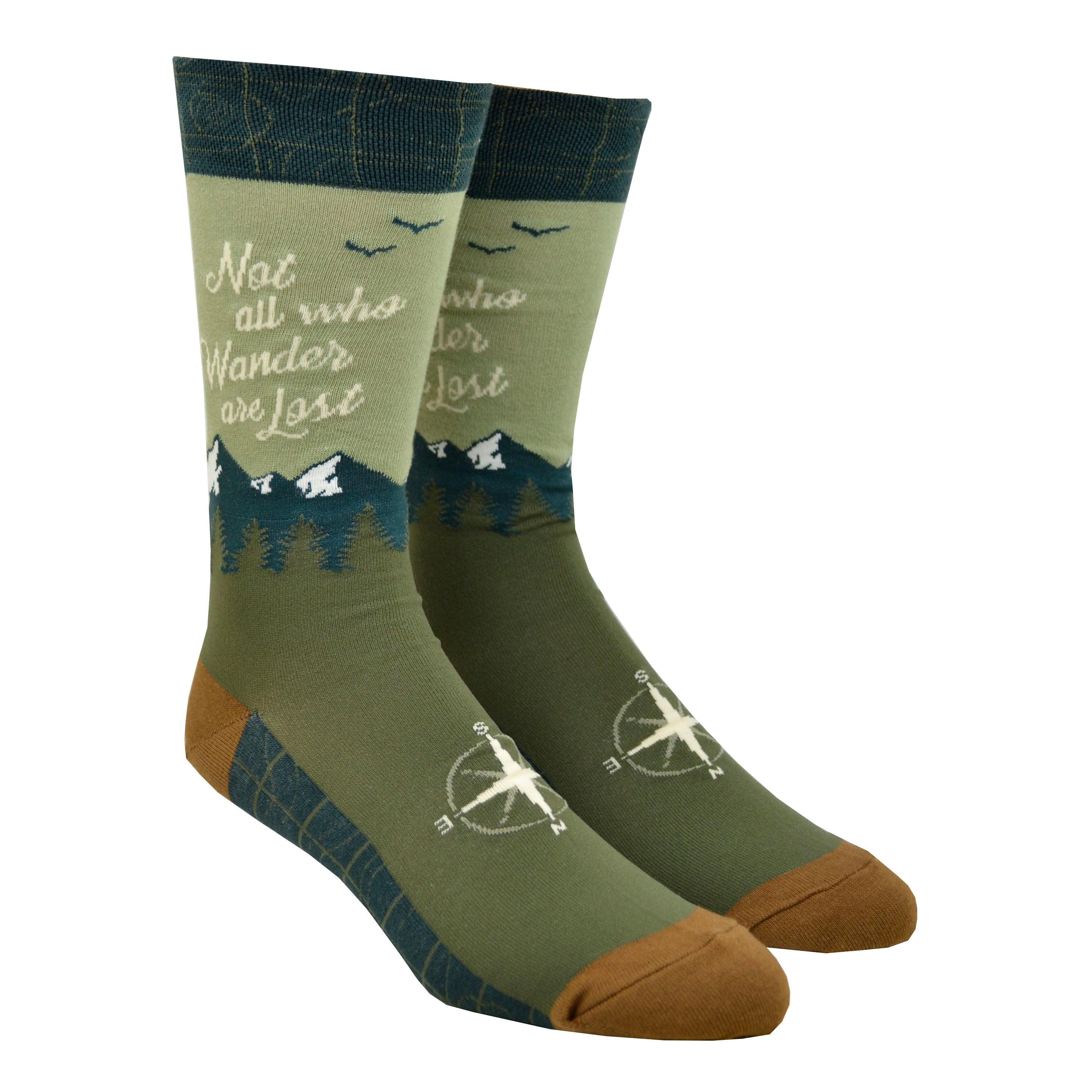 Shown on leg forms, a pair of men's Foot Traffic brand cotton crew socks with a dark blue cuff, green heel, and mustard toe. The leg of this sock is light green with a blue mountain rage and the words, 