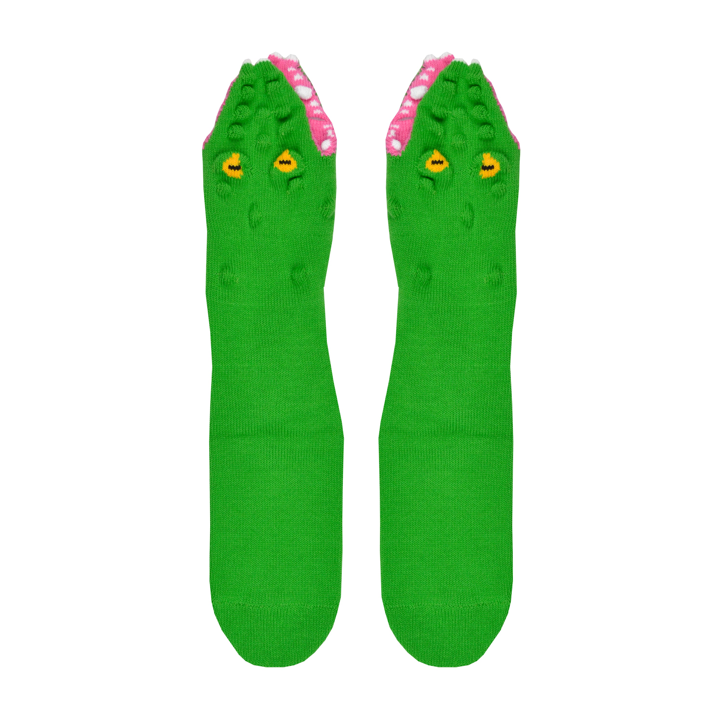 Shown in a flatlay, a pair of Foot Traffic, green cotton women's crew socks with three dimensional pattern of scaly alligator eating the foot