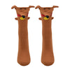 Shown on a foot mold from a different angle, a pair of Foot Traffic, brown cotton women's crew socks with three dimensional pattern of cute brown dachshund dog