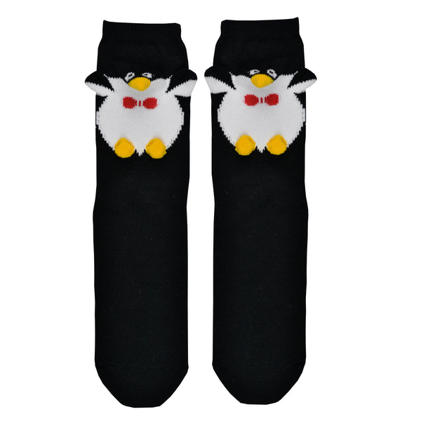 Shown in a flatlay, a pair of Foot Traffic, black and white cotton women's crew socks with three dimensional pattern of cute penguin