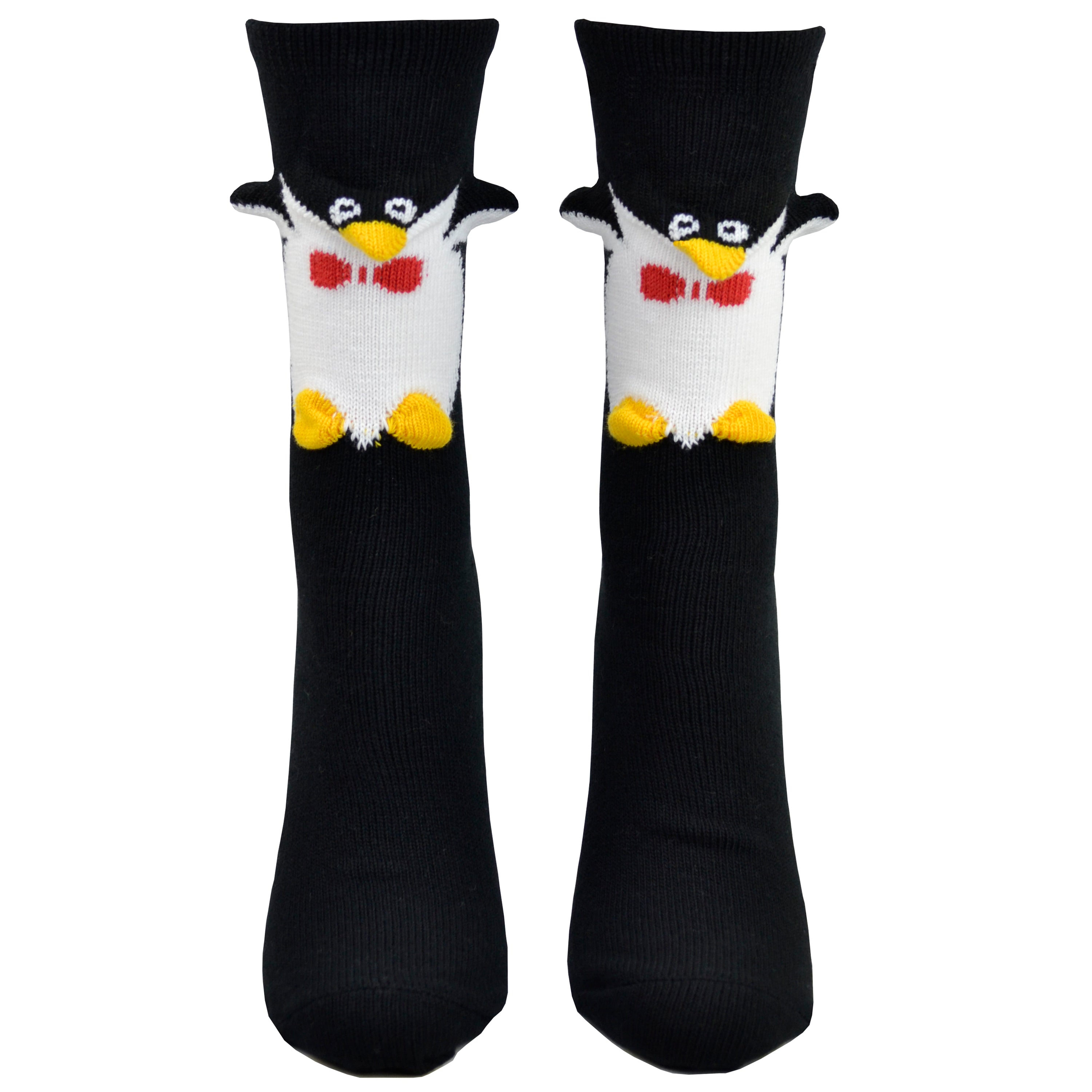 Shown on a foot mold from a different angle, a pair of Foot Traffic, black and white cotton women's crew socks with three dimensional pattern of cute penguin