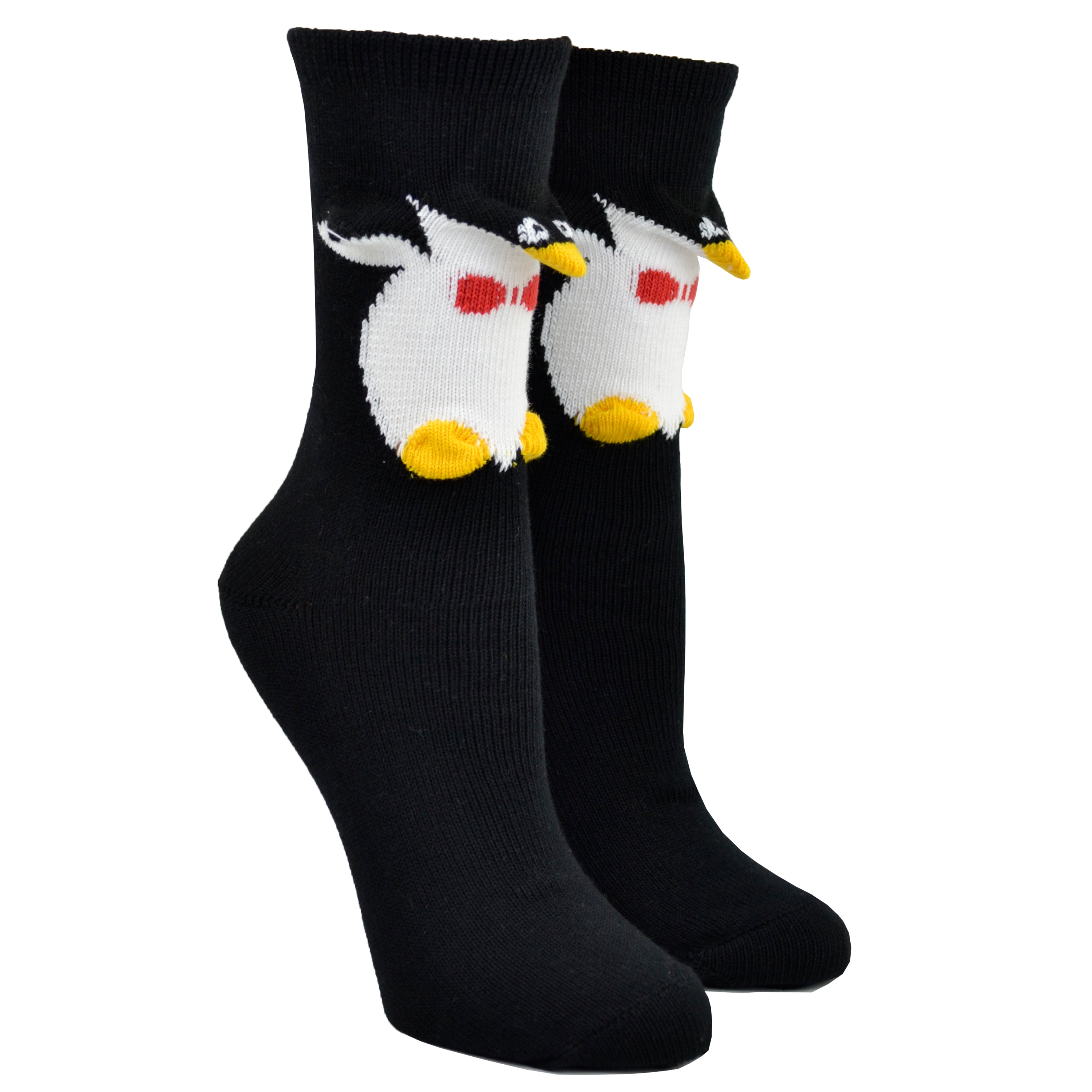 Shown on a foot mold, a pair of Foot Traffic, black and white cotton women's crew socks with three dimensional pattern of cute penguin