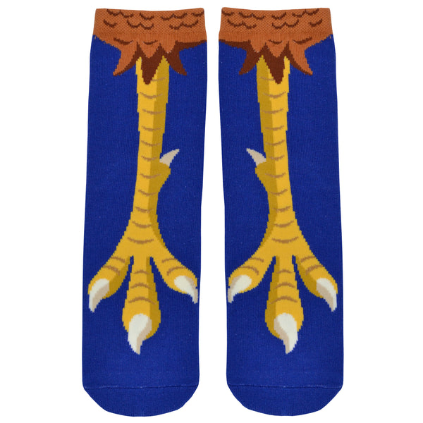 Shown in a flatlay, a pair of Foot Traffic brand, women's cotton crew socks in royal blue with a brown cuff. These socks feature a yellow chicken foot design on the front and little rubber grips on the foot of the sock.