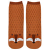 Shown in a flatlay, a pair of women's Foot Traffic brand cotton crew length non-skid socks in light brown with a brown cuff and a fox face on the toe.