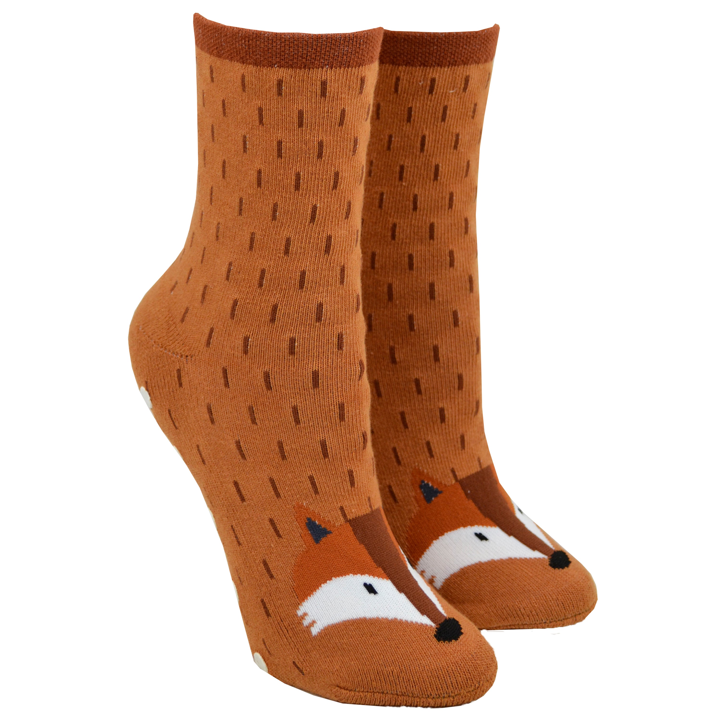 Shown on leg forms, a pair of women's Foot Traffic brand cotton crew length non-skid socks in light brown with a brown cuff and a fox face on the toe.