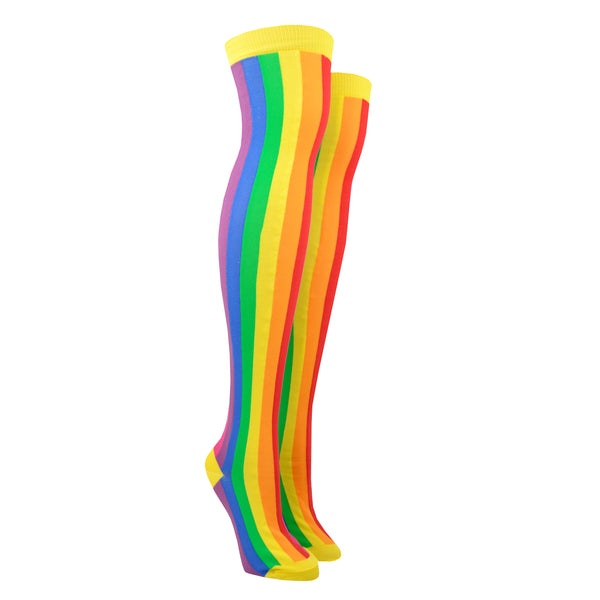 Vertical rainbow striped cotton women's over the knee socks with a yellow toe and cuff are shown on a leg form.