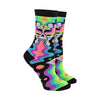 Shown on a foot mold, a pair of Gumball Poodle black cotton crew socks with illustrative skull spewing neon rainbow psychedelic spirals all down the foot