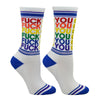 Shown on a leg form, these white cotton unisex crew socks with a blue toe and striped cuff by the brand Gumball Poodle feature the words "FUCK YOU" in rainbow colors repeated down the leg and emoji smiley faces running down the front.