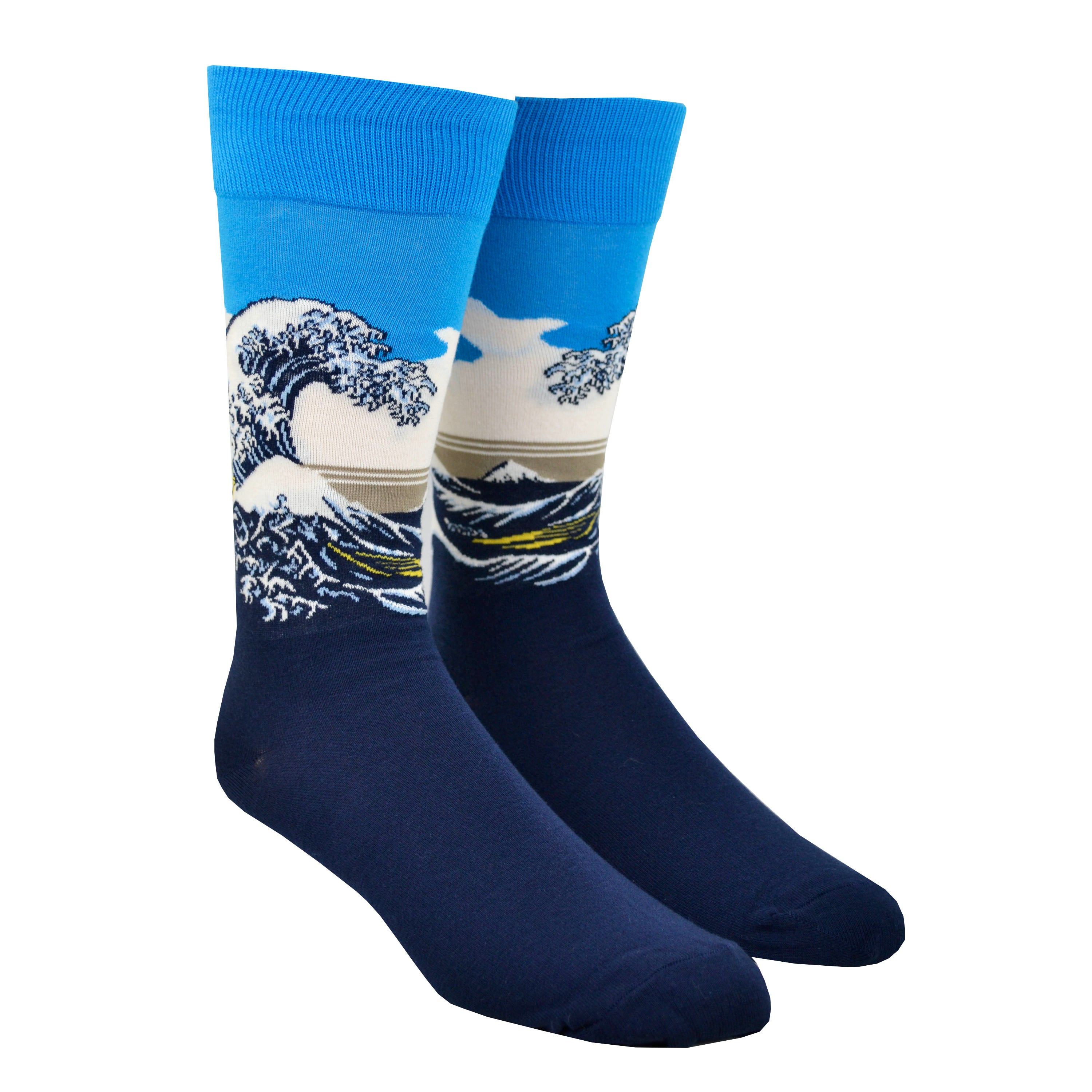 Shown on a leg form, these blue cotton men's crew socks by the brand Hot Sox feature the famous print The Great Wave by the Japanese artist Hokusai.
