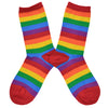 Shown in a flatlay, a pair of Hot Sox cotton women’s crew socks with classic, bright, horizontal rainbow stripes