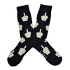 Shown in a flatlay, a pair of K. Bell’s black cotton men’s crew socks with white hands flipping the middle finger