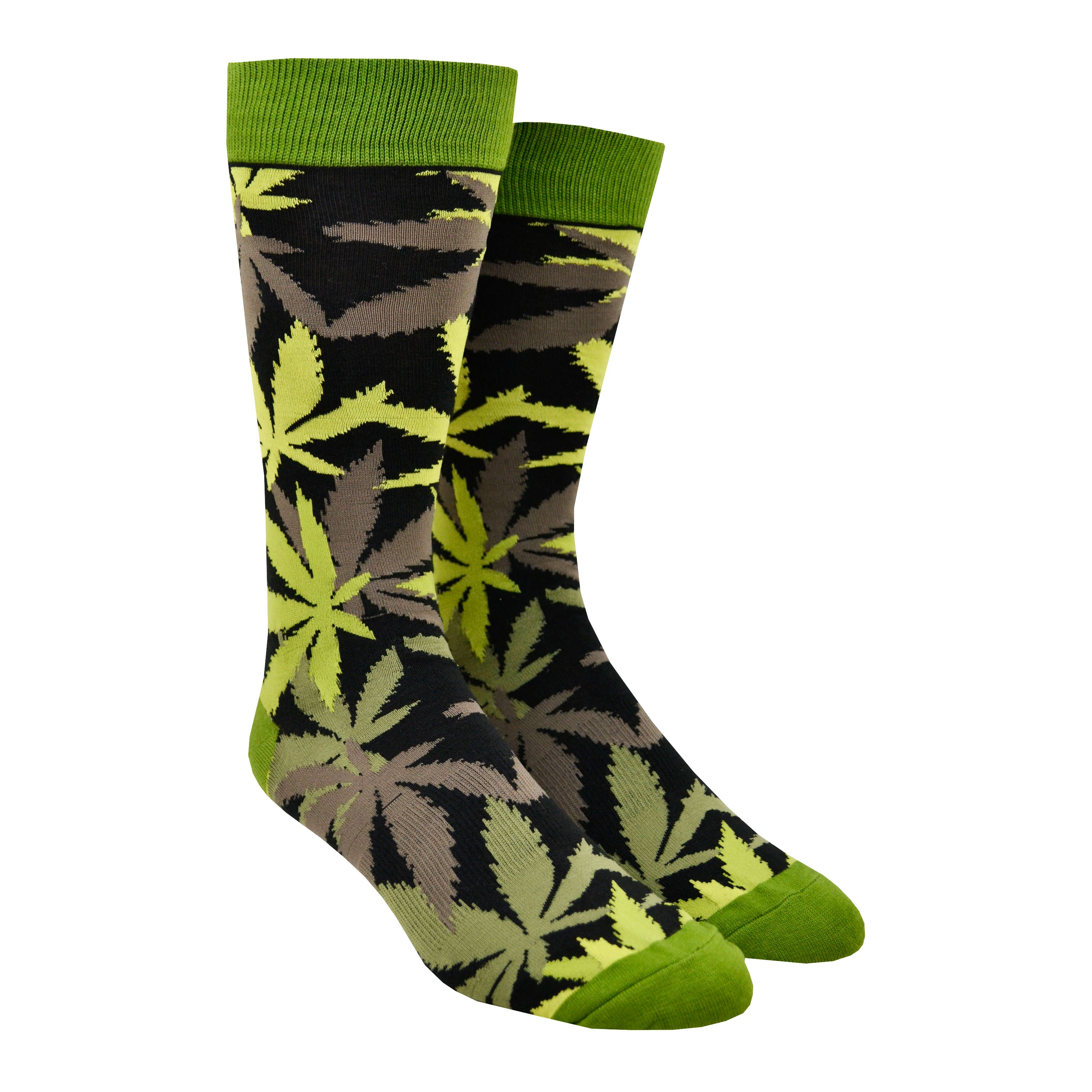 Shown on leg forms, a pair of men's crew length K.Bell brand nylon and cotton socks in black with a bright green heel, toe, and cuff. The sock features an all over motif of marijuana leaves in shades of green and brown.