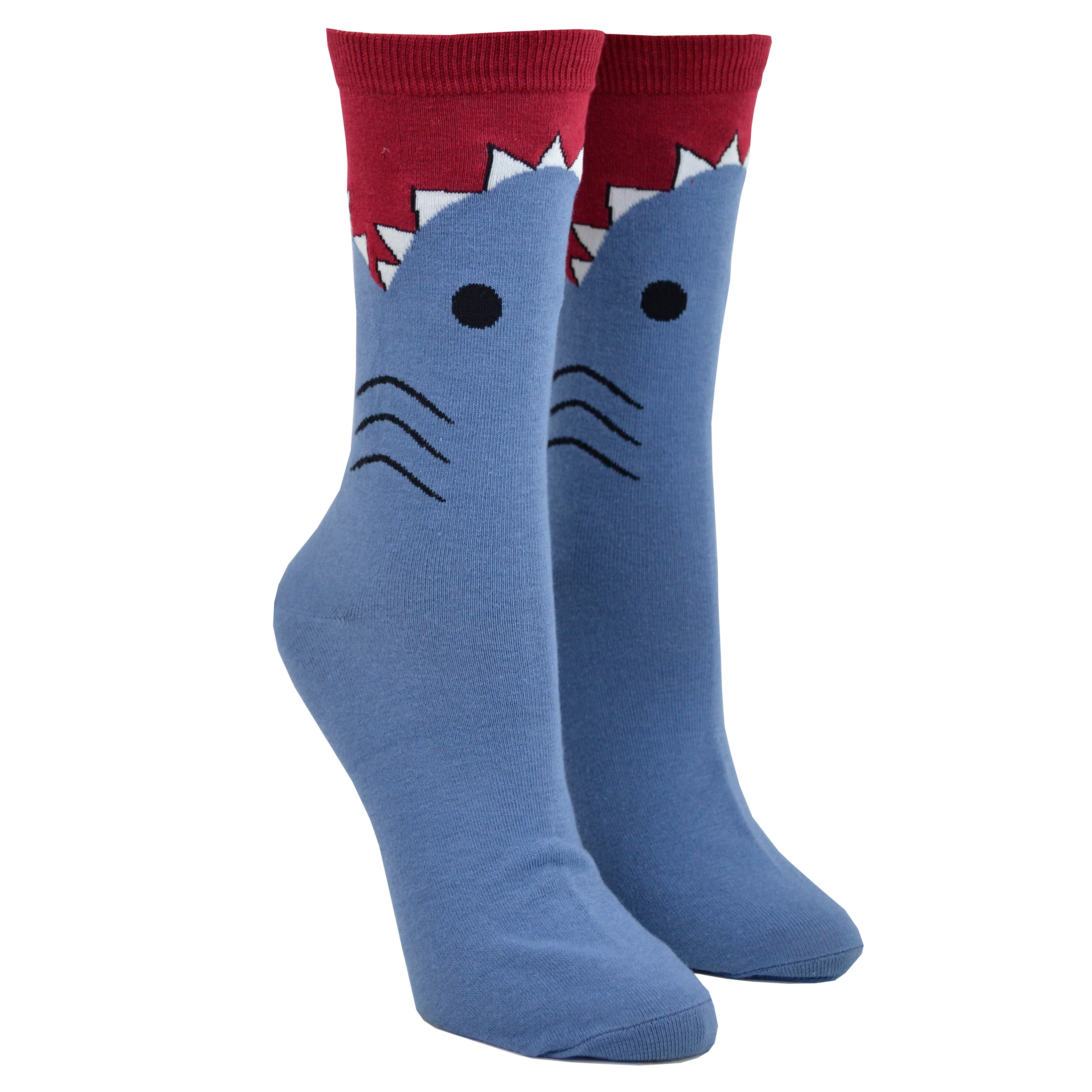 Shown on a leg form, these blue cotton women's novelty crew socks with a red top and cuff by the brand K Bell make it look like a shark is eating your leg, showing the sharks gills, eyes and teeth chomping on your calf.