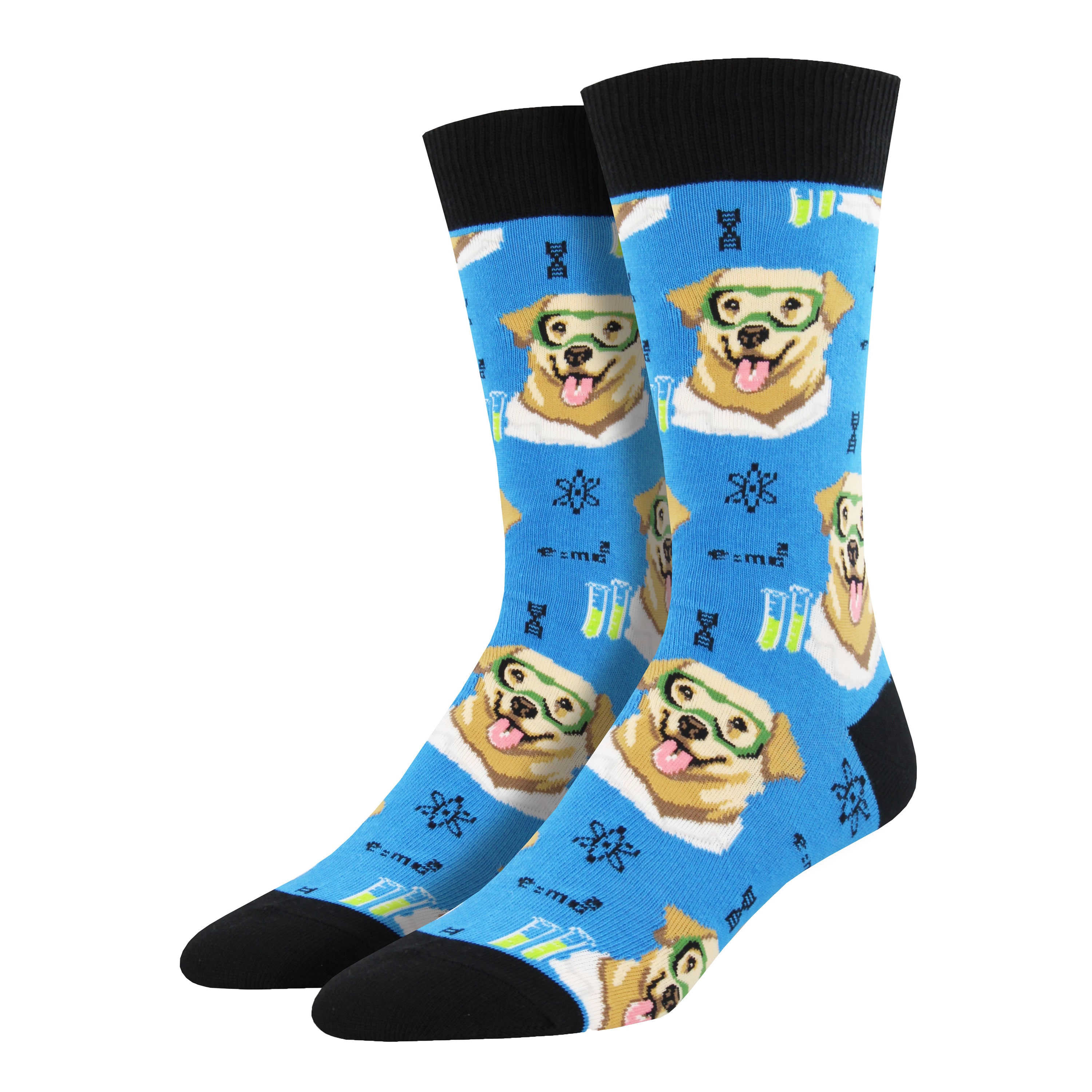 Shown on a foot form, a pair of Socksmith's sky blue cotton men's crew socks with black heel/cuff/toe, test tubes, atoms, mathematic equations and labradors in lab coats and safety goggles