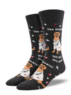 leg forms displaying a pair of charcoal gray socks featuring a golden retriever wearing a white lab coat and small pills and capsules with the text "the dogtor will see you now."