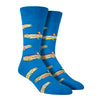 Shown on leg forms, a pair of Socksmith brand men's cotton crew socks in ocean blue with an all over motif of rainbow trout.