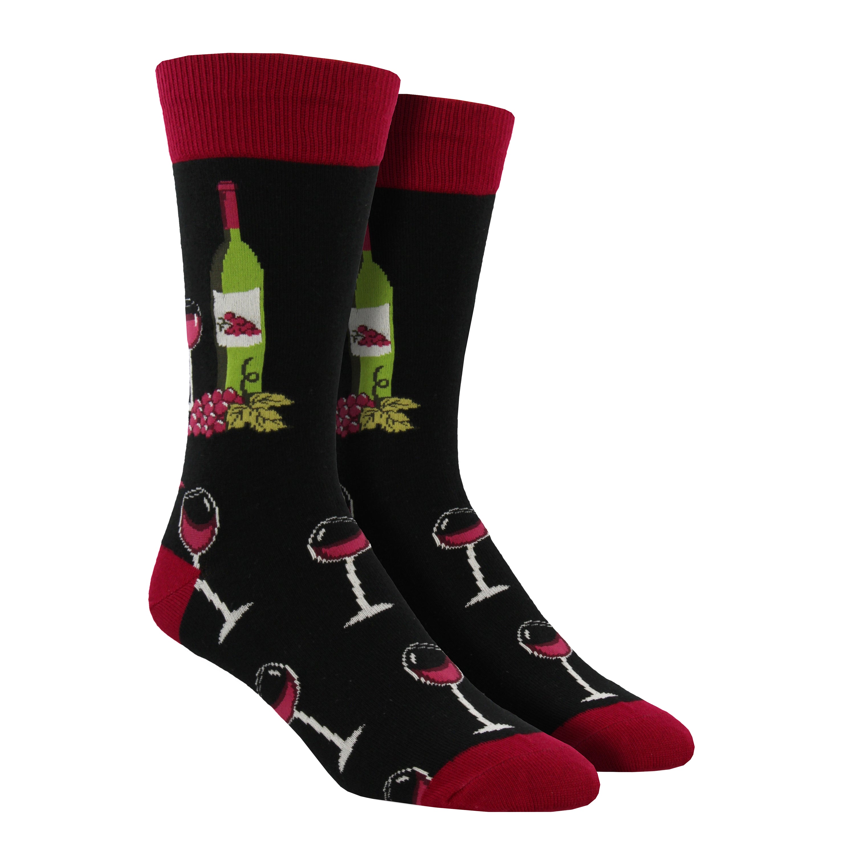 Shown on leg forms, a pair of Socksmith men's cotton crew sock in black with a dark red cuff, heel, and toe. On the leg of the socks is a green wine bottle, a glass of red wine and some grapes. The full wine glasses continue down the foot of the sock