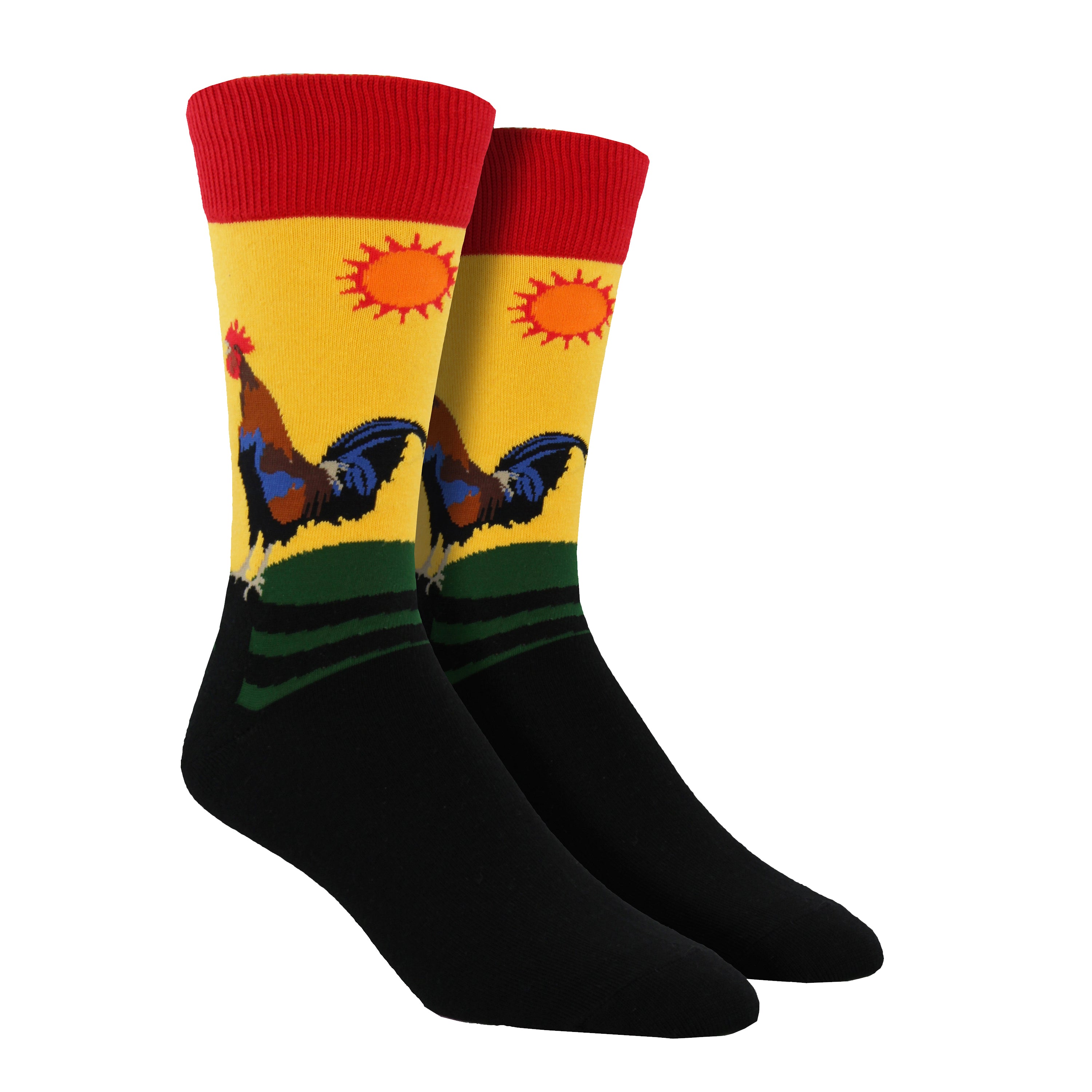 A rooster is seen standing on a farm fence greeting the morning on this yellow cotton crew sock for men by Socksmith. 