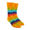 Model wearing a pair of unisex Maggie’s Organic cotton crew socks with tie dye of yellow, green, blue, red and purple