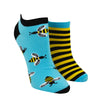 Shown on foot forms, a pair of unisex mismatched Many Mornings brand cotton ankle socks. One sock is blue with a black heel/toe/cuff and black and yellow bee motif all over the sock. The second sock is a black and yellow striped sock with blue heel/toe/cuff.