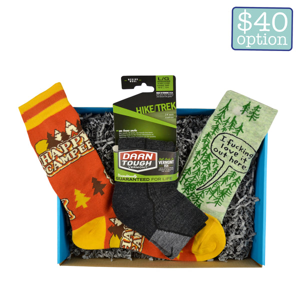 A surprise box with nature themed cotton crew socks and high-quality wool hiking socks