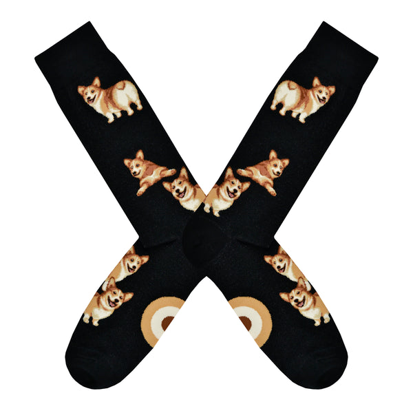These black cotton men's fun novelty crew socks by the brand Mod Socks feature adorable Corgi dogs smiling, sitting down and some standing up showing their cute butts.