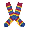 Shown in a flatlay, a pair of Mod Socks’ cotton men's crew socks with muted rainbow stripes