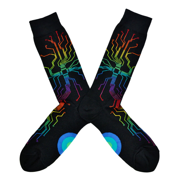 Shown in a flatlay, a pair of Mod Socks’ black cotton men's crew socks with a rainbow computer motherboard pattern