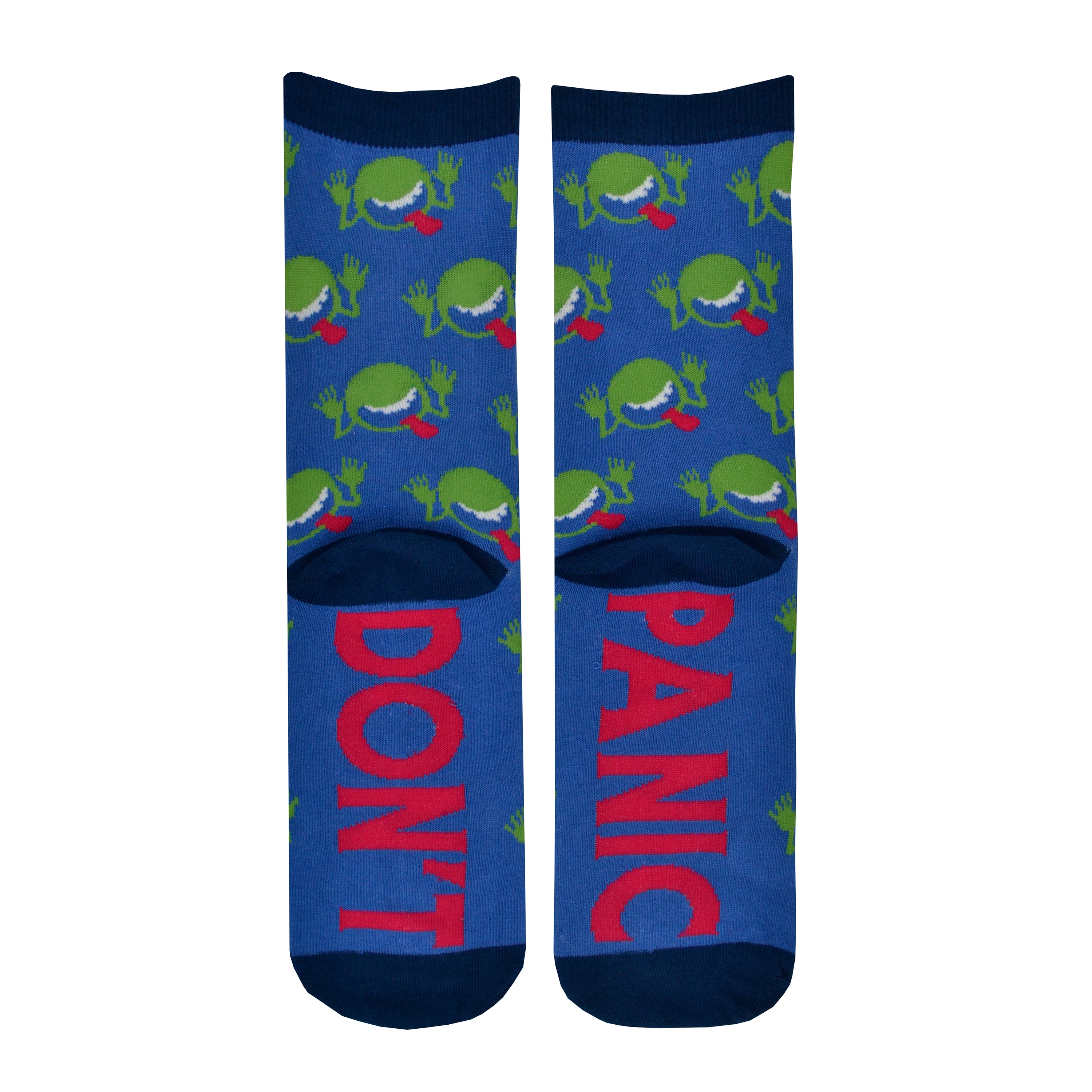 Shown in a flatlay, the rear side of a pair of unisex Out of Print blue cotton crew socks with green goofy faces sticking out their tongue like on the book cover, “Don’t” on the sole of one foot, “Panic” on the other, and navy cuff/heel/toe