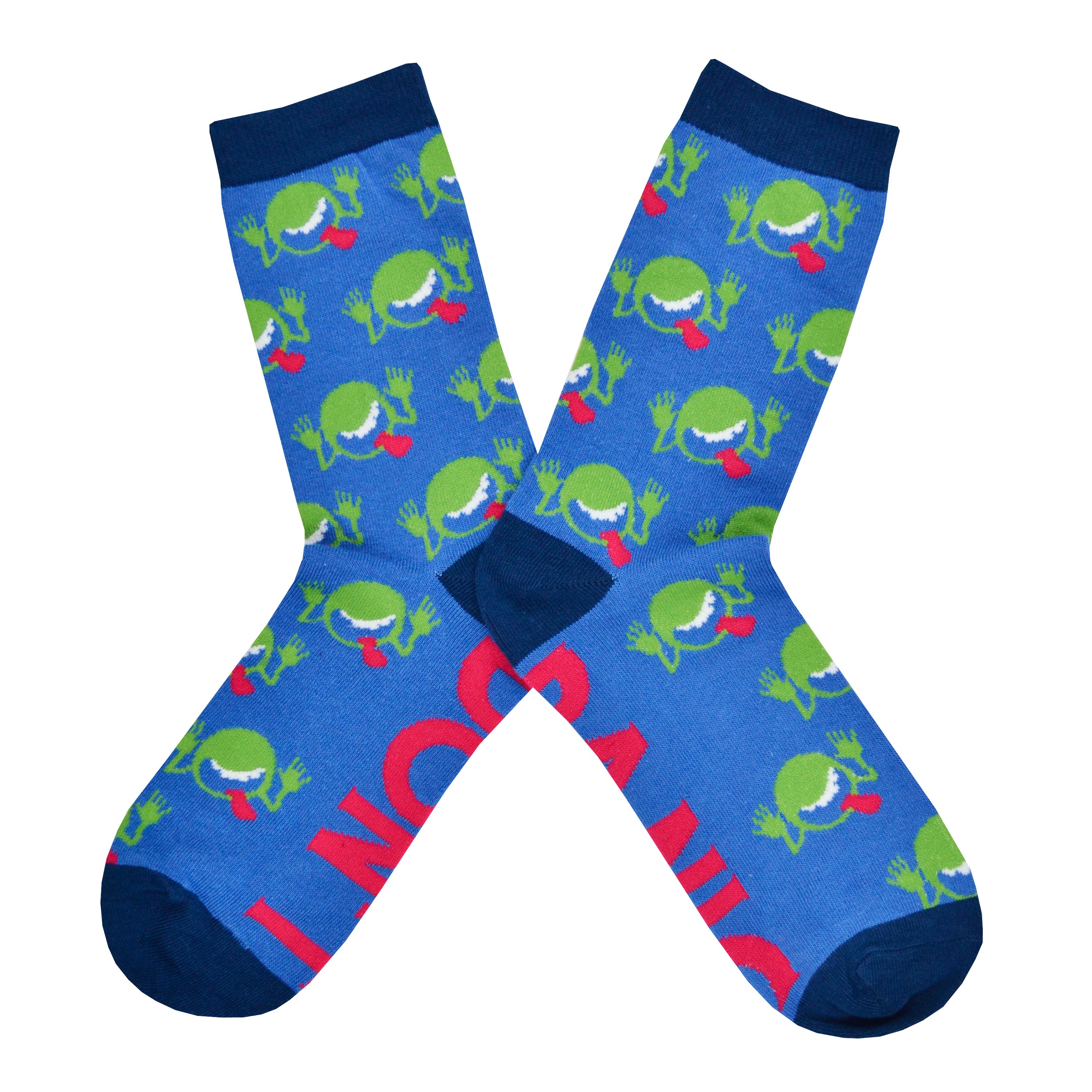 Shown in a flatlay, a pair of unisex Out of Print blue cotton crew socks with green goofy faces sticking out their tongue like on the book cover, “Don’t” on the sole of one foot, “Panic” on the other, and navy cuff/heel/toe