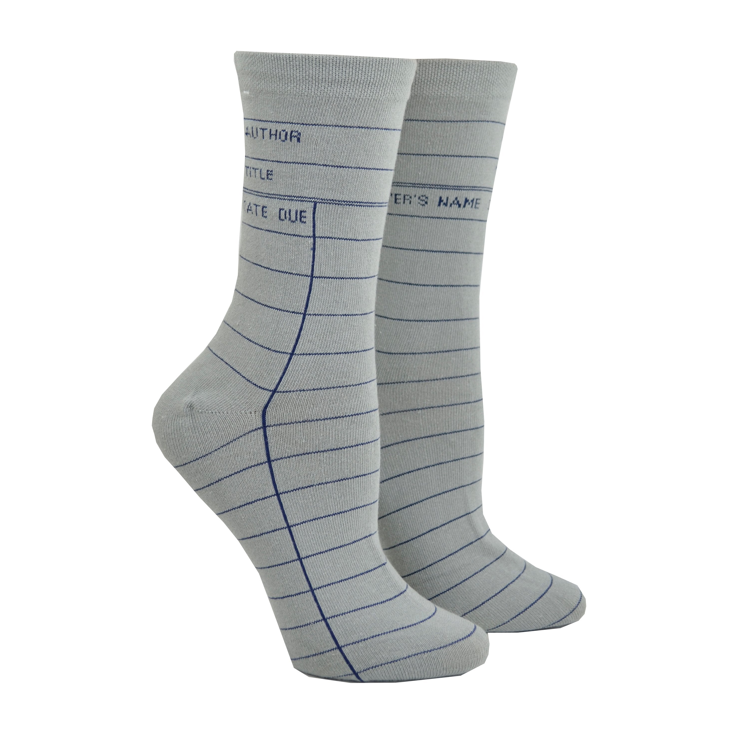 Shown on a leg form in the women's size, these gray cotton unisex crew socks by the brand Out of Print feature the iconic library card design with the words 