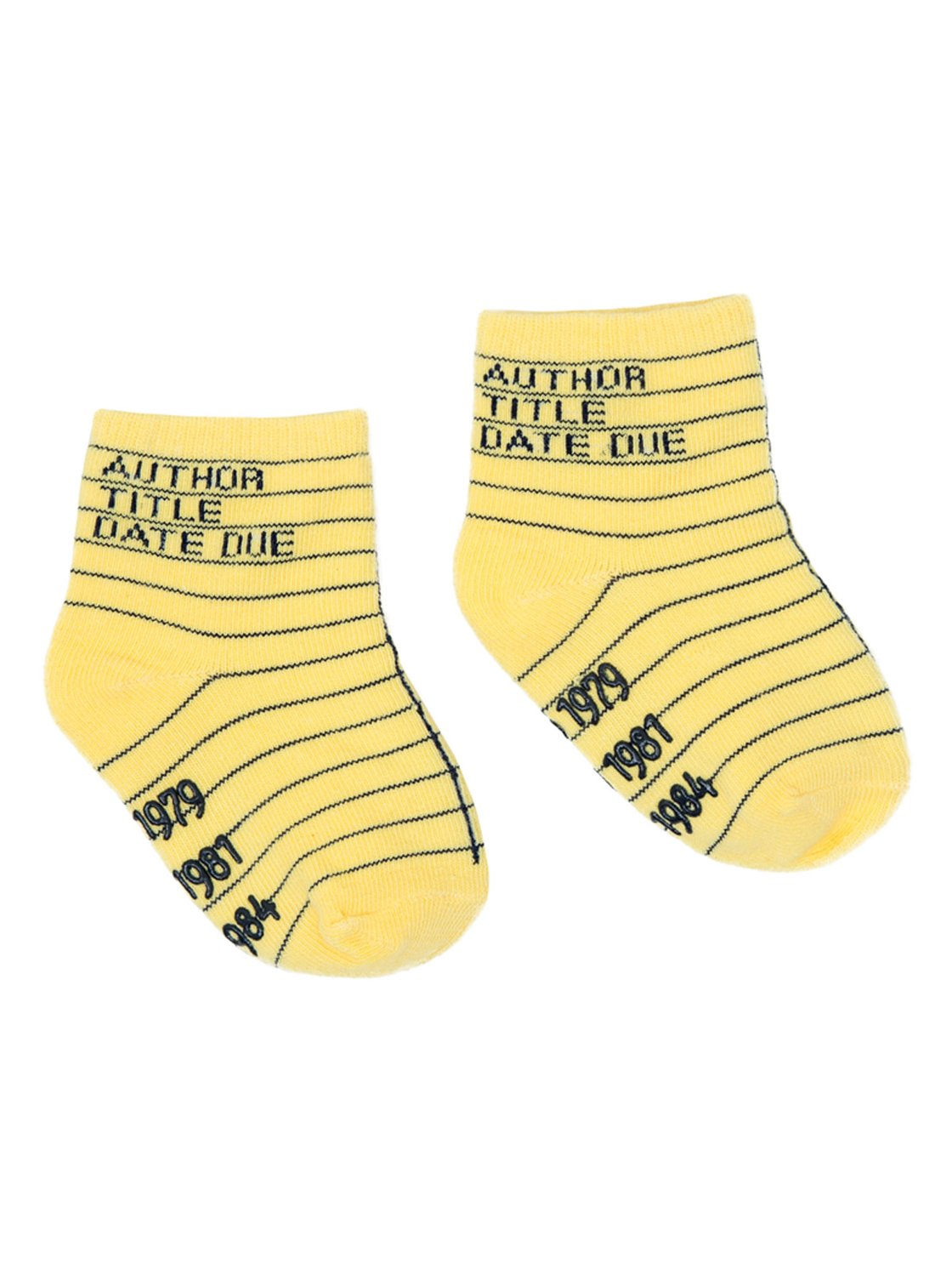These kid's cotton crew socks in yellow by the brand Out of Print feature the iconic library card design with the words 