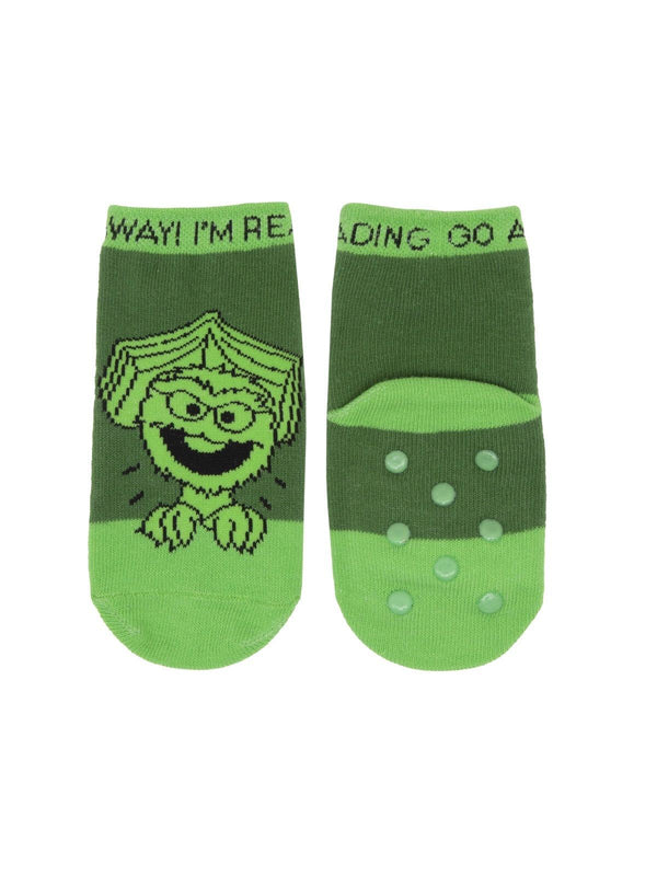 Out of Print brand cotton kids crew length sock in green featuring Oscar the Grouch with a book in his head. The text along the top reads, "Go Away! I'm Reading".  These socks also have silicon non-slip dots on the sole.