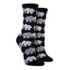 Shown on leg forms, a pair of women's Socksmith brand cotton crew socks in black with an all over design of 2 elephants linking trunks with a little red heart between them.