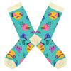 Shown in a flatlay, a pair of Socksmith brand women's bamboo crew socks in aqua with a cream heel, toe, and cuff. This sock features an all over design of 90's geometric shapes in bright colors.