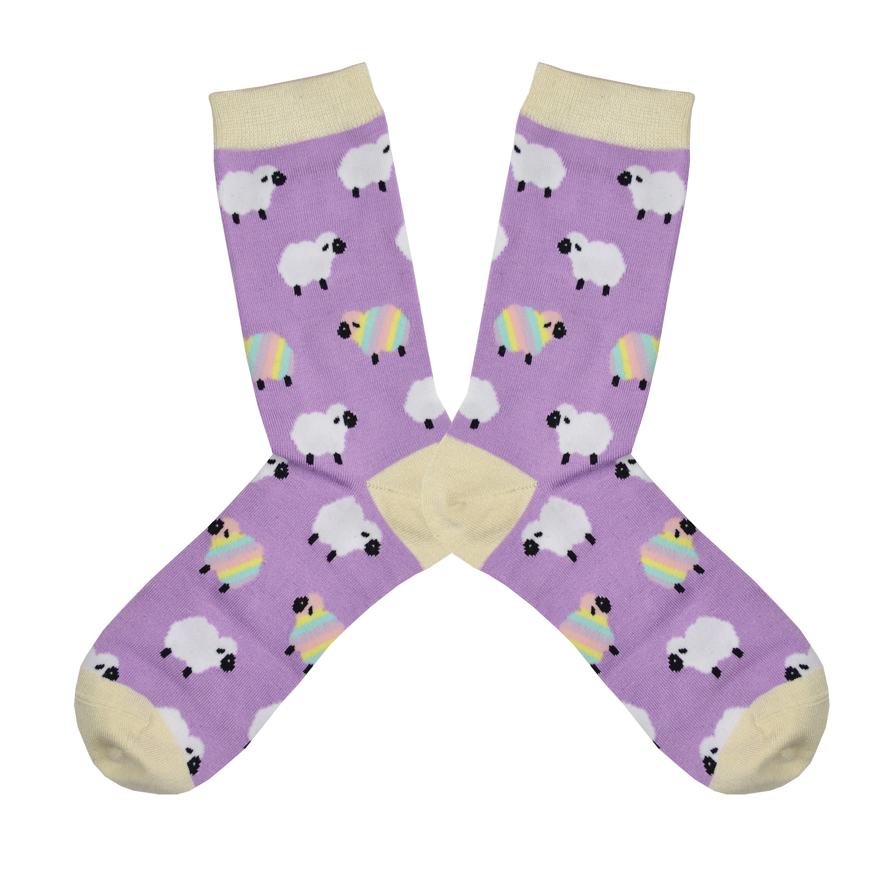 Shown in a flatlay, a pair of Socksmith brand women's bamboo crew socks in lilac with a cream toe, heel, and cuff. This sock features an all over motif of white fluffy sheep with a few pastel rainbow sheep mixed in.