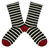 Shown in a flatlay, a pair of Socksmith brand women's bamboo crew roll-top socks in black and white stripes with a red heel and toe.