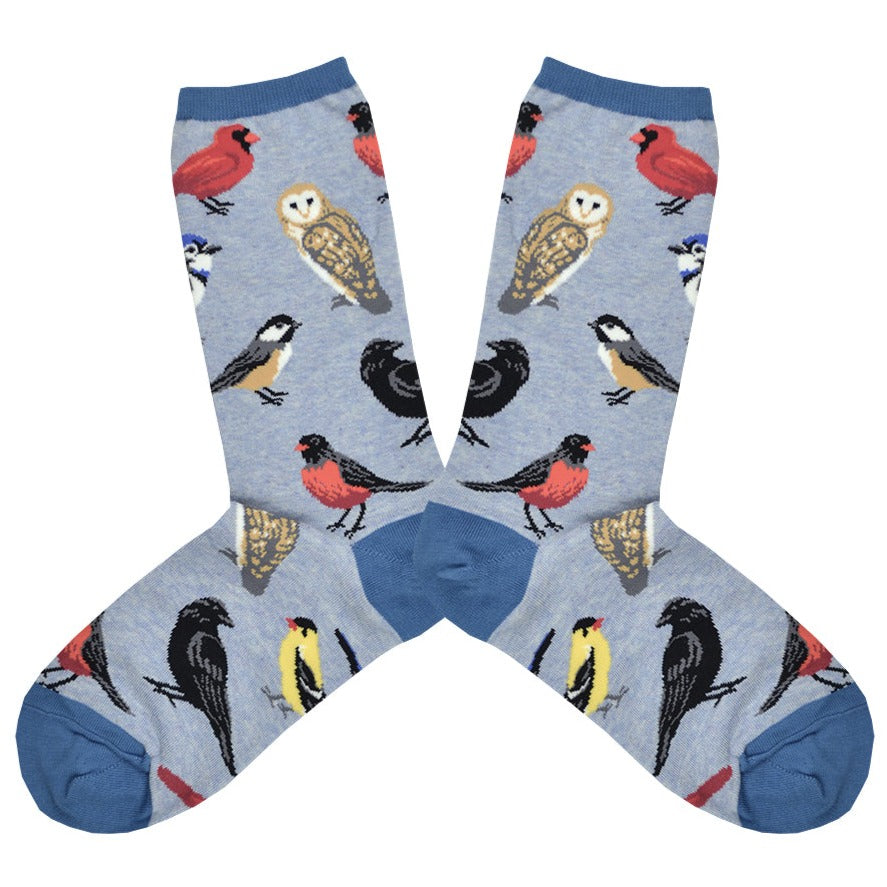 Shown in a flatlay, a pair of Socksmith's gray cotton women’s crew socks with wild North-American bird pattern