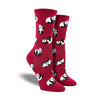 Shown on leg forms, a pair of women's Socksmith cotton crew socks in red with an all over motif of little pandas rolling around.