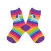 A pair of cotton Sock Smith brand kids crew length socks with a vibrant purple cuff, heel, and toe feature a white unicorn design on the leg and neon stripes down the sock.