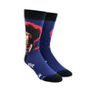 Shown on a leg form, a pair of men blue cotton crew socks by the brand Socksmith with black heel/cuff/toe, and Jimi Hendrix portrait up the leg.
