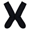 Shown in a flatlay, a pair of Socksmith's bamboo men's crew socks in black