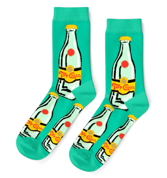 Shown in a flaylay, these mint green women's crew socks have an all over motif of the popular drink Topo Chico with the words Top Chica on the bottle. 