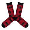 These red bamboo men's crew socks with a black heel, toe and cuff by Socksmith feature black cats lying, sitting and walking.