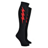 Shown on a foot form, a pair of Sock It To Me cotton knee high socks in black with a large red thunderbolt on each side