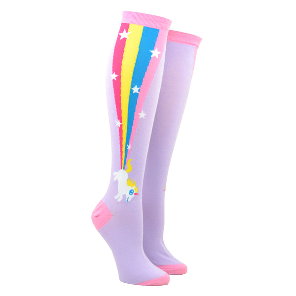 Shown on leg forms, a pair of Sock it to Me brand unisex cotton knee high socks in lilac with a pink heel, cuff, and toe. The sides of this sock feature a cartoon unicorn farting a magical rainbow that goes up the sock.