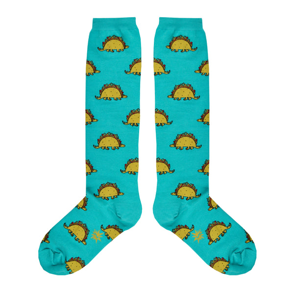 These blue cotton unisex knee high socks by the brand Sock It To Me feature dinosaurs with bodies that look like a taco.