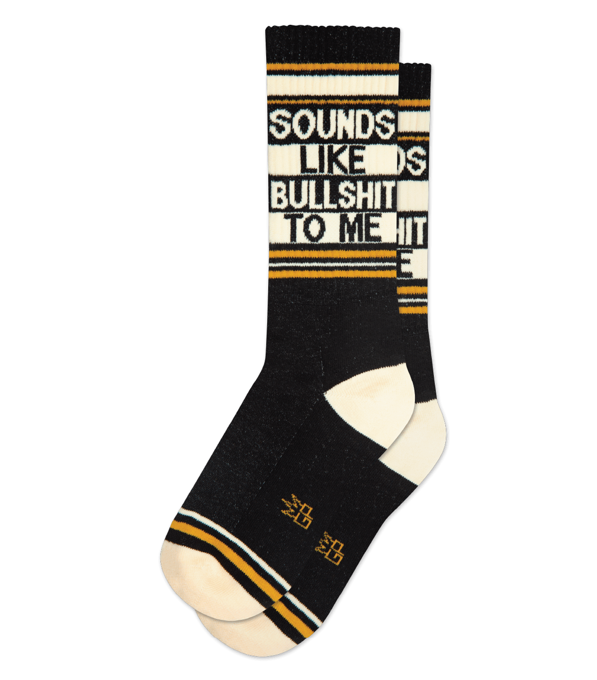 a .png of a pair of black socks with ivory toe and heel, orange stripe details and ivory text that says 